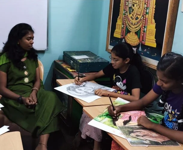 Art instruction at Kondaiah Raju School