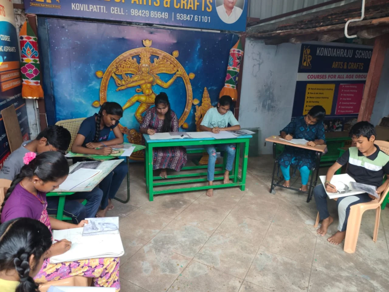 Students learning drawing at Kondaiah Raju School